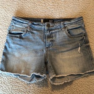 Stretch denim mid to high waist 3 inch inseam. Can be rolled up or worn down.